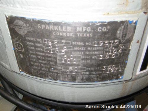Used Sparkler Filter, Model 14-S-7, 316 Stainless Steel. Internal rated 66 psi at 350 degrees F. Carbon steel jacket rated 50 psi at 350 degrees F. (7) 14" Diameter shallow plates, 6.23 square foot s...