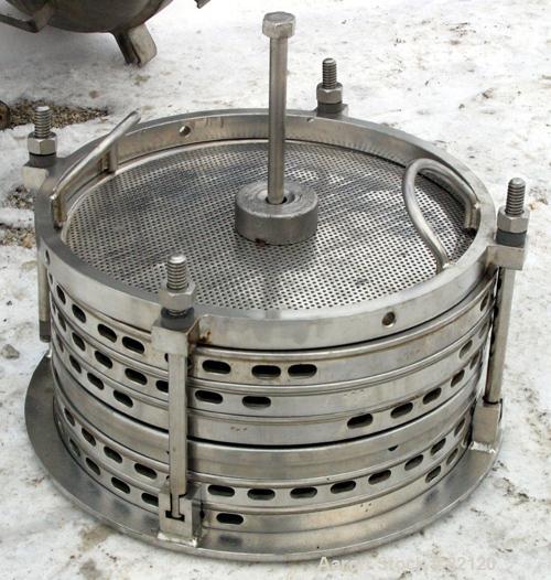 USED: Sparkler horizontal plate filter, model 14-S-7, 316 stainless steel. 5.6 sq ft filter area, .38 cu ft cake capacity, 400 gallons per hour. Vertical, non-jacketed tank 16" diameter x 8" deep, in...
