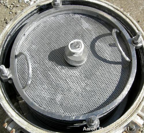 USED: Sparkler horizontal plate filter, model 14S7, 316 stainless steel. 5.6 square feet filter area, .38 cubic feet cake capacity, 400 gallons per hour. Vertical carbon steel jacketed tank 16" diame...