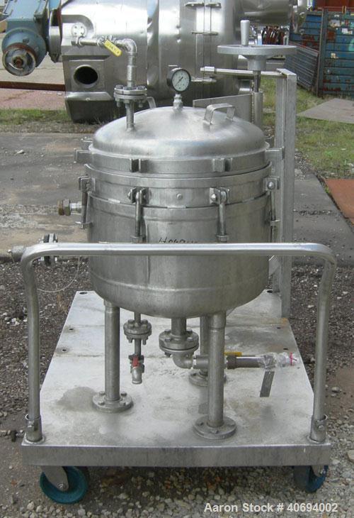 Used Sparkler Filter Horizontal Plate Filter, model 18-S-7, 316L stainless steel. Approximate 10.8 square feet filter area, .67 cubic feet cake capacity, 550 gallons per hour. Vertical jacketed tank ...