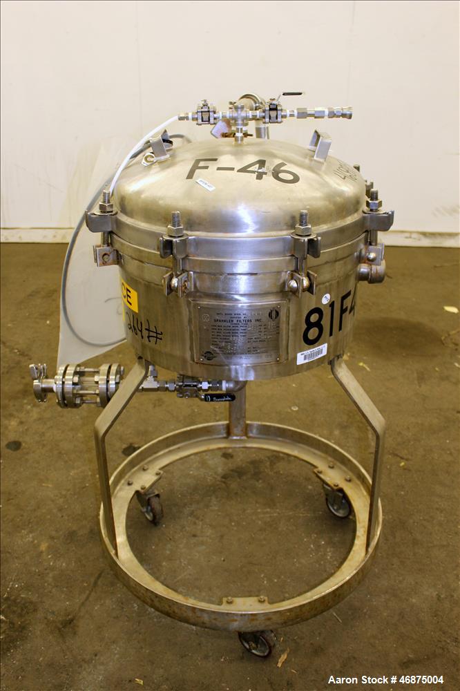 Used Sparkler Filter Pressure Leaf Filter, Model 18D4, 316L Stainless Steel, Vertical. 6.44 Square feet filter area, 0.776 cubic feet cake capacity (No Plates). Approximate 20" diameter x 8.5" straig...