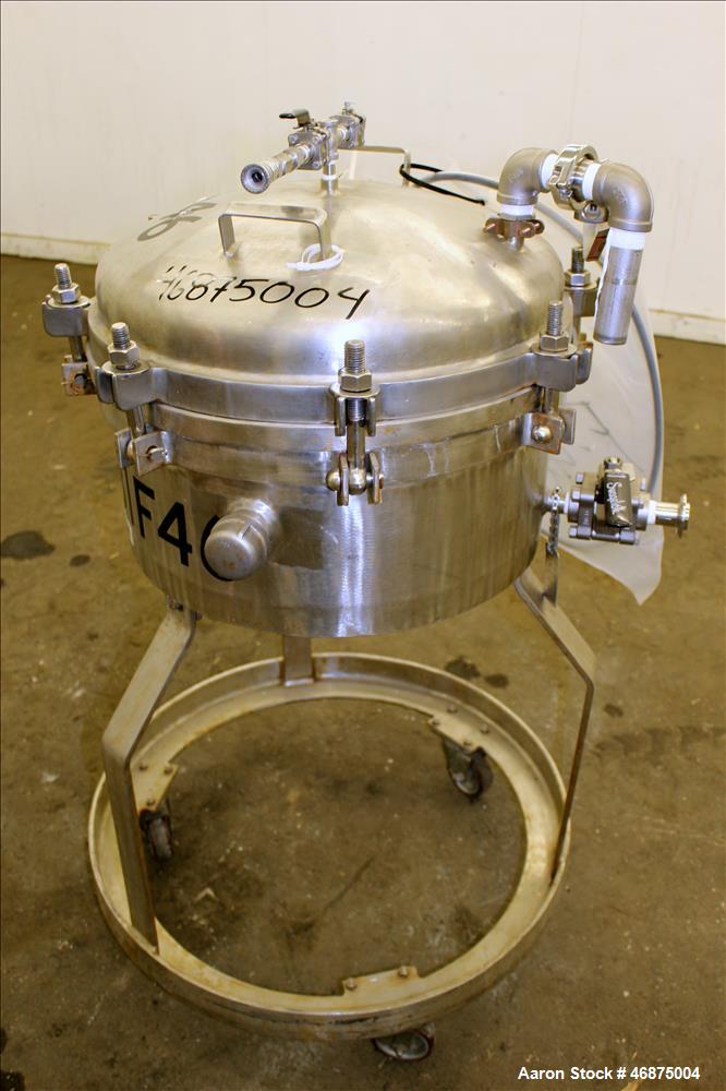 Used Sparkler Filter Pressure Leaf Filter, Model 18D4, 316L Stainless Steel, Vertical. 6.44 Square feet filter area, 0.776 cubic feet cake capacity (No Plates). Approximate 20" diameter x 8.5" straig...