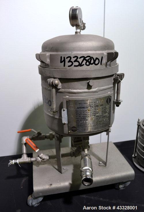 Used Sparkler Horizontal Pilot Plate Filter, Model 18-6, 316 Stainless Steel. Approximate 2 square feet filter area, (0.153) cubic feet cake capacity, 150 gallons per hour. Vertical jacketed tank app...