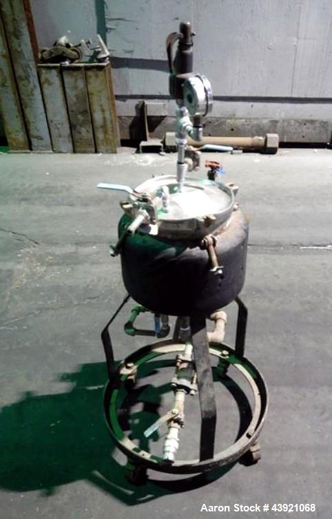 Used Sparkler Horizontal Plate Filter, Model 8-3, Stainless Steel. Approximate 1 square feet filter area, .073 cubic feet cake capacity, 3.375 gallon tank volume with filters, (3) 8" diameter filter ...