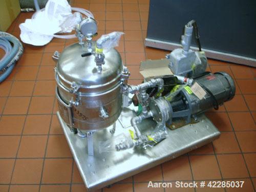 Used Sparkler Pilot Size Horizontal Plate Filter, Model 8-6, 316L Stainless Steel. 2 square feet filter area, (0.153) cubic feet cake capacity, flow capacity 100 gallons per hour. Vertical jacketed t...