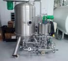Used Padovan Pressure Leaf Filter, Model G9. Sanitary stainless steel, 8.60 square meter (90 square feet) centrifugal dry cake discharge vertical tank, horizontal leaf pack design with a 3 kW top dri...