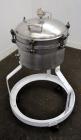 Used Sparkler Filter Horizontal Plate Filter, Model 14-7, 304 Stainless Steel. 6.23 Square feet filter area, 0.229 cubic feet cake capacity. Vertical non-jacketed tank 16