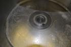 Used Sparkler Filter Horizontal Plate Filter, Model 14-7, 304 Stainless Steel. 6.23 Square feet filter area, 0.229 cubic feet cake capacity. Vertical non-jacketed tank 16