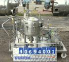 Used Sparkler Horizontal Plate Filter, model 14-D-4, 316 stainless steel. Approximate 3.2 square feet filter area, .38 cubic feet cake capacity, 220 gallons per hour. Vertical jacketed tank 16