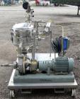 Used Sparkler Horizontal Plate Filter, model 14-D-4, 316 stainless steel. Approximate 3.2 square feet filter area, .38 cubic feet cake capacity, 220 gallons per hour. Vertical jacketed tank 16