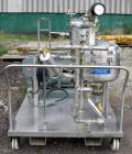 Used Sparkler Horizontal Plate Filter, model 14-D-4, 316 stainless steel. Approximate 3.2 square feet filter area, .38 cubic feet cake capacity, 220 gallons per hour. Vertical jacketed tank 16