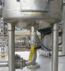 Used Sparkler Horizontal Plate Filter, model 14-D-4, 316 stainless steel. Approximate 3.2 square feet filter area, .38 cubic feet cake capacity, 220 gallons per hour. Vertical jacketed tank 16