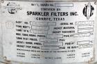 USED: Sparkler horizontal plate filter, model 14-S-7, 316 stainless steel. 5.6 sq ft filter area, .38 cu ft cake capacity, 400 gallons per hour. Vertical, non-jacketed tank 16