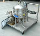 USED: Sparkler horizontal plate filter, model 14-S-7, 316 stainless steel. 5.6 sq ft filter area, .38 cu ft cake capacity, 400 gallons per hour. Vertical jacketed tank 16