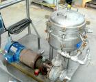 USED: Sparkler horizontal plate filter, model 14-S-7, 316 stainless steel. 5.6 sq ft filter area, .38 cu ft cake capacity, 400 gallons per hour. Vertical jacketed tank 16