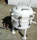USED: Sparkler horizontal plate filter, model 14S7, 316 stainless steel. 5.6 square feet filter area, .38 cubic feet cake capacity, 400 gallons per hour. Vertical carbon steel jacketed tank 16