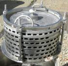 USED: Sparkler horizontal plate filter, model 14S7, 316 stainless steel. 5.6 square feet filter area, .38 cubic feet cake capacity, 400 gallons per hour. Vertical carbon steel jacketed tank 16