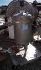 Used Sparkler Filter Horizontal Plate Filter, Model 18-D-12, Hastelloy SB333. 11.27 square feet filter area, 1.35 cubic feet cake capacity. Vertical non-jacketed tank 20