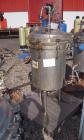 Used Sparkler Filter Horizontal Plate Filter, Model 18-D-12, Hastelloy SB333. 11.27 square feet filter area, 1.35 cubic feet cake capacity. Vertical non-jacketed tank 20