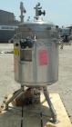 Used Sparkler Horizontal Plate Filter, Model 18-D-12, 316 Stainless Steel. Approximately 19.32 square feet filter area, 2.3 cubic feet cake capacity. Vertical tank 20