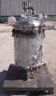 Used Sparkler Horizontal Plate Filter, Model 18-D-12, 316 Stainless Steel. Approximately 19.32 square feet filter area, 2.3 cubic feet cake capacity. Vertical tank 20