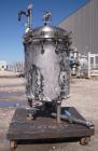 Used Sparkler Horizontal Plate Filter, Model 18-D-12, 316 Stainless Steel. Approximately 19.32 square feet filter area, 2.3 cubic feet cake capacity. Vertical tank 20