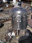 Used Sparkler Filter Horizontal Plate Filter, Model 18-D-8, 316 stainless steel. 12.3 square feet filter area, 1.8 cubic feet cake capacity, 650 gallons per hour. Vertical non-jacketed tank 20