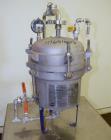 Used Sparkler Filters Pilot Horizontal Plate Filter, Model 8-6, 316 Stainless Steel. 2 Square feet filter area, (0.153) cubic feet cake capacity, 100 gallons per hour flow capacity. Vertical non-jack...
