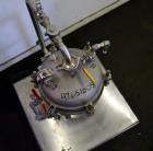 Used Sparkler Filters Pilot Horizontal Plate Filter, Model 8-6, 316 Stainless Steel. 2 Square feet filter area, (0.153) cubic feet cake capacity, 100 gallons per hour flow capacity. Vertical non-jack...