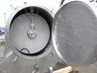 Used United States Filter Auto-Jet Self-Cleaning Pressure Leaf Filter, 600 square feet filter area, model 600, 304 stainless steel. Horizontal shell 54