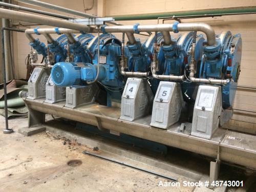Used Fournier Rotary Press, Model 6-900/6000 CV. 36" wheels, 6 channels. Approximately 7,000 hours run. Weight: 17,130 lbs. Previously used in a waste water application.