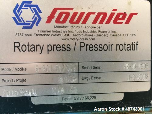 Used Fournier Rotary Press, Model 6-900/6000 CV. 36" wheels, 6 channels. Approximately 7,000 hours run. Weight: 17,130 lbs. Previously used in a waste water application.