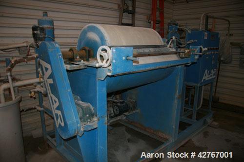 Used Alar Rotary Vacuum Filter, Auto-Vac 230 with receiver, type 1A recirculation system, Carbon Steel construction. Filter Aid economizer, vacuum pump, automatic wash down and shut off. Drum is 2 fo...