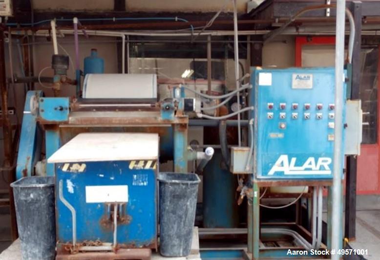 Used Alar Auto-Vac Filter System. Consisting of: (1) Alar rotary vacuum filter, Model 220. 24" Diameter x 24" face, Carbon steel drum, approximate 12.6 square feet filter area. Drum driven by a appro...