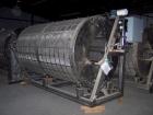 Unused-NEW: Rolling drum filter. Filter constantly filters water by turning as water flows through. Filter rate approximately 350 gallons/min. Filter media goes between screens on drum perimeter. All...