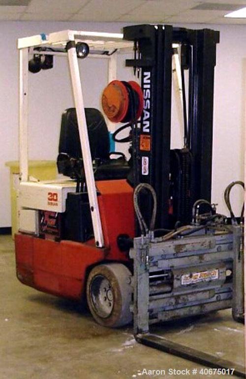 Used Nissan forklift, model 30, battery, with charger.