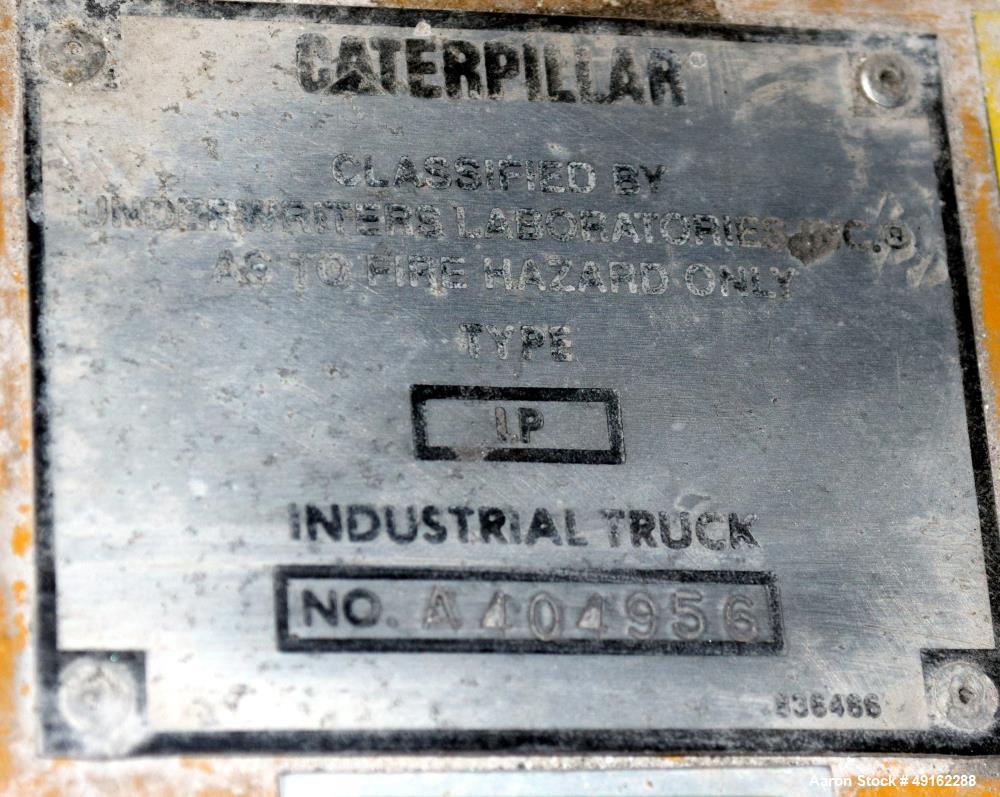 Used Caterpillar 5000 Pound Propane Forklift, Model V50E. Solid tires, double mast, approximate 48" long forks. Serial# 4EG00527.