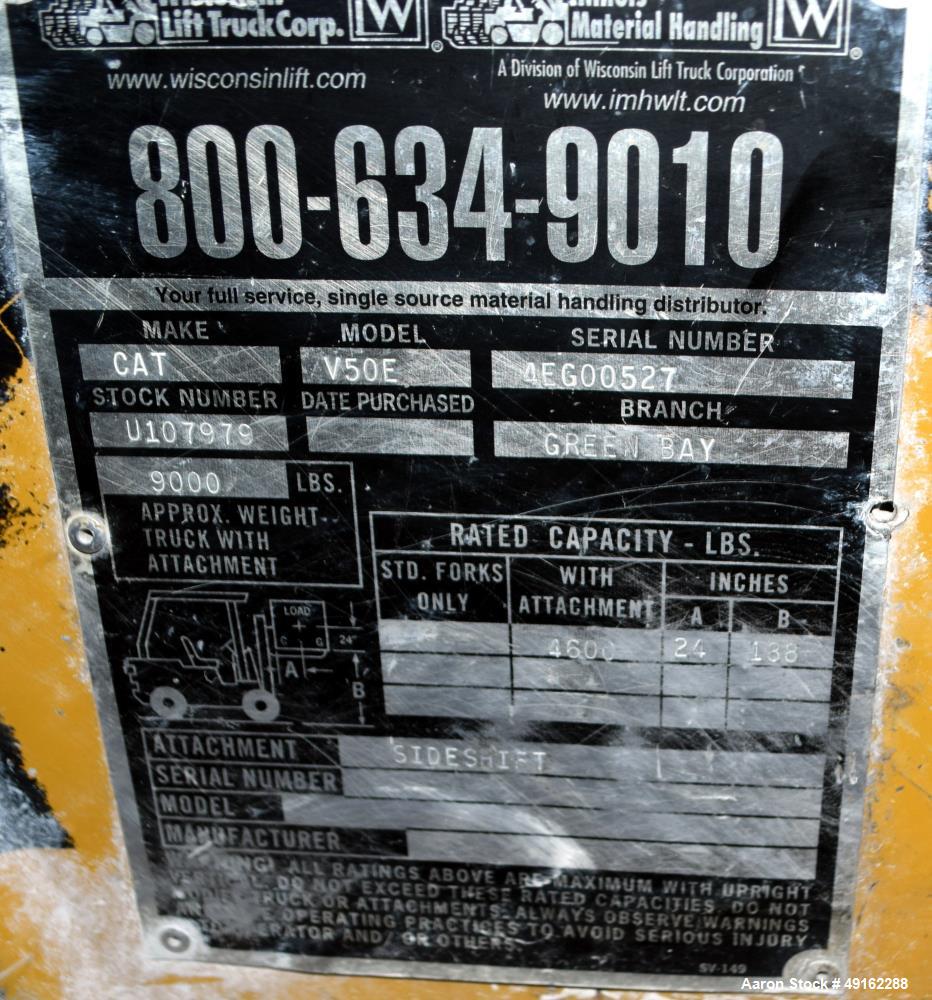 Used Caterpillar 5000 Pound Propane Forklift, Model V50E. Solid tires, double mast, approximate 48" long forks. Serial# 4EG00527.
