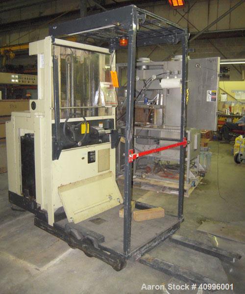Used Crown Stand Up Electric Order Picker Fork Lift, Model 30SP36TT. 3000 pound capacity. Includes an Exide charger, model NPC12-3-680L.