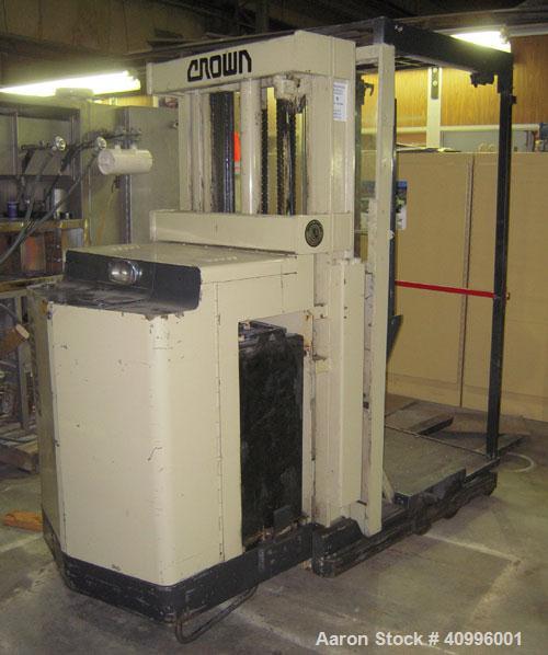 Used Crown Stand Up Electric Order Picker Fork Lift, Model 30SP36TT. 3000 pound capacity. Includes an Exide charger, model NPC12-3-680L.