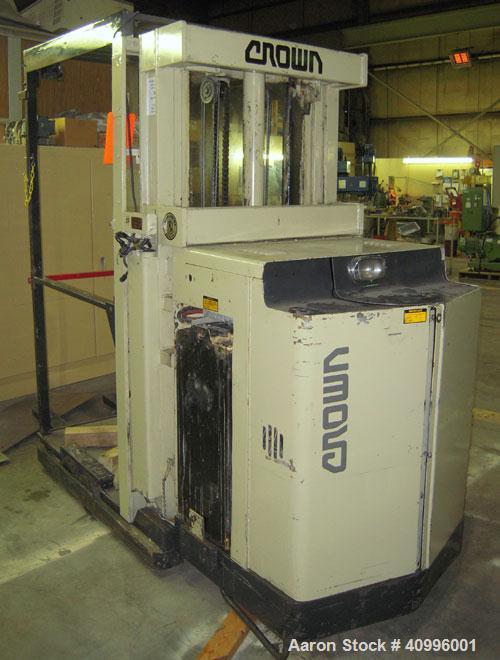 Used Crown Stand Up Electric Order Picker Fork Lift, Model 30SP36TT. 3000 pound capacity. Includes an Exide charger, model NPC12-3-680L.