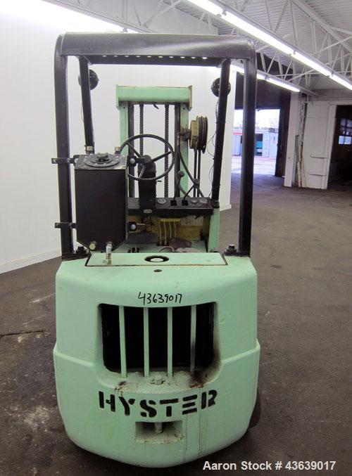 Used Hyster Lift Truck, Model S40F, 4000 Pound Capacity. Double mast, (2) 41-1/2” long  X 4” wide forks. Solid tire, runs on gas. Missing engine cover, and seat.