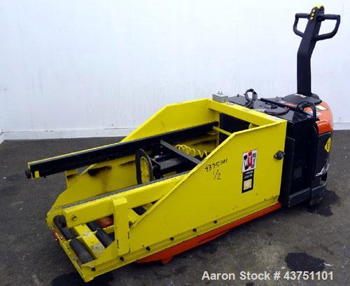 Used Linde XP Walkie Electric Pallet Truck, Model EW60-02/EE.  6000 Pound capacity.  24 Volt.  Includes an MTC Attach-A-Puller battery changer, model ABP-24-V-24, 3000 pound capacity.  Built 2000.