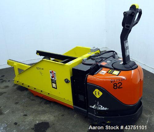 Used Linde XP Walkie Electric Pallet Truck, Model EW60-02/EE.  6000 Pound capacity.  24 Volt.  Includes an MTC Attach-A-Puller battery changer, model ABP-24-V-24, 3000 pound capacity.  Built 2000.