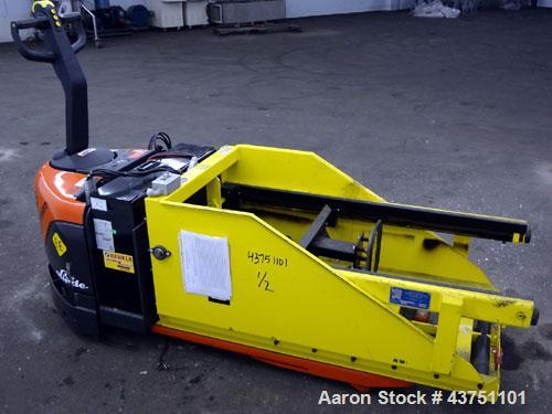Used Linde XP Walkie Electric Pallet Truck, Model EW60-02/EE.  6000 Pound capacity.  24 Volt.  Includes an MTC Attach-A-Puller battery changer, model ABP-24-V-24, 3000 pound capacity.  Built 2000.