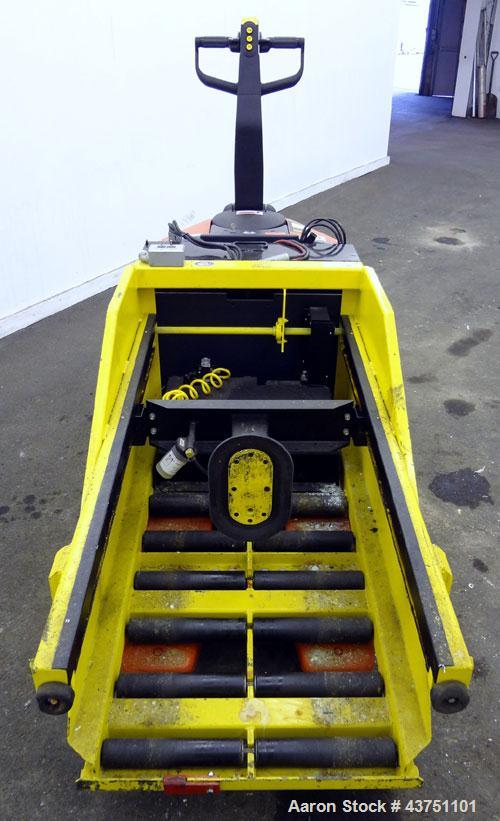 Used Linde XP Walkie Electric Pallet Truck, Model EW60-02/EE.  6000 Pound capacity.  24 Volt.  Includes an MTC Attach-A-Puller battery changer, model ABP-24-V-24, 3000 pound capacity.  Built 2000.
