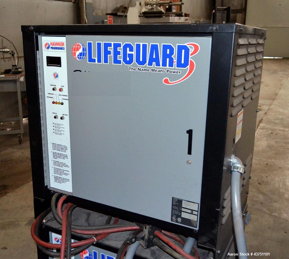 Used Linde XP Walkie Electric Pallet Truck, Model EW60-02/EE.  6000 Pound capacity.  24 Volt.  Includes an MTC Attach-A-Puller battery changer, model ABP-24-V-24, 3000 pound capacity.  Built 2000.