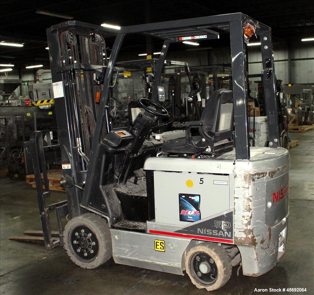 Used Nissan Electric Fork Lift/Truck, Model CP1B2L25S. 9385 hours. Maximum 3450 lbs capacity. 42" long forks. Has side shift, maximum 217" lift height. Serial# 569063.