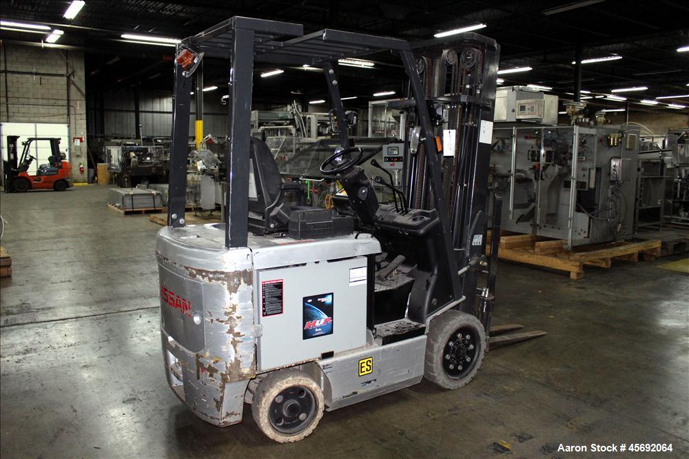 Used Nissan Electric Fork Lift/Truck, Model CP1B2L25S. 9385 hours. Maximum 3450 lbs capacity. 42" long forks. Has side shift, maximum 217" lift height. Serial# 569063.
