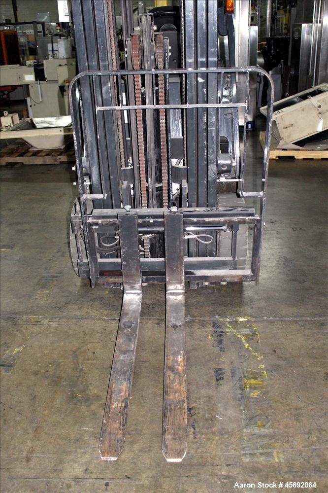 Used Nissan Electric Fork Lift/Truck, Model CP1B2L25S. 9385 hours. Maximum 3450 lbs capacity. 42" long forks. Has side shift, maximum 217" lift height. Serial# 569063.
